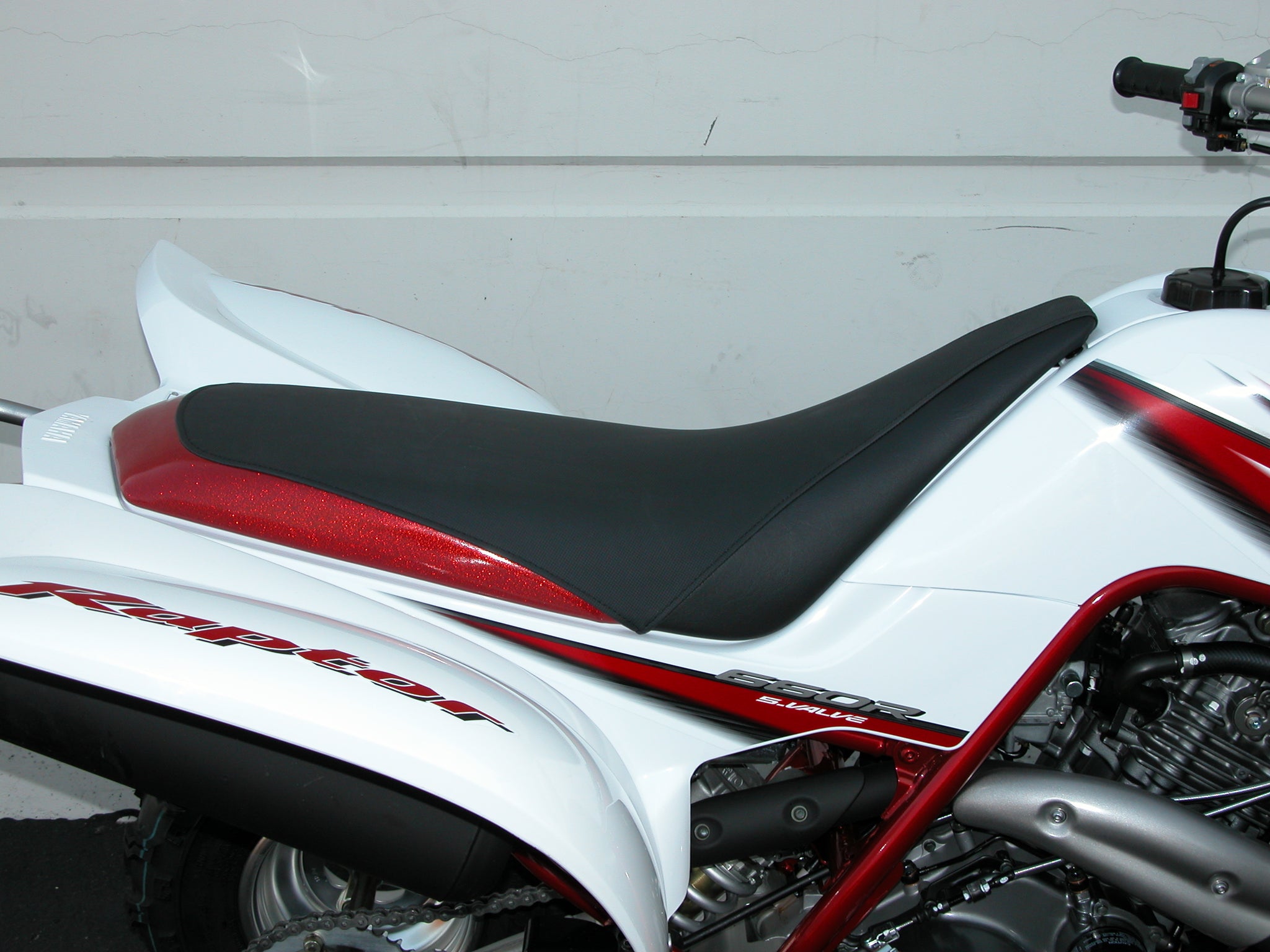 thumbnail image 2 of Enjoy Manufacturing Seat Cover – Yamaha Raptor 660R 2001-2005 – All Black / Red Ribs – Gripper 2 of 5